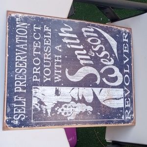 Tin Distressed Wall Art S&W Self Preservation